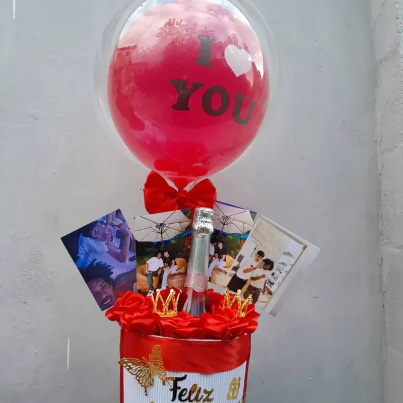 Caja de regalo con globos burbujas