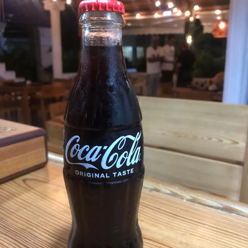Refresco Coca Cola de botella 