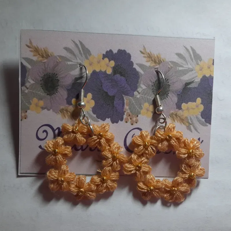 Aretes tejidos aro de flores colgante 