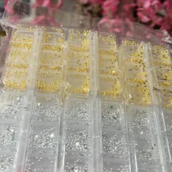 Caja de media perlas doradas y plateadas