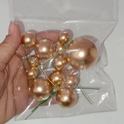 Estuche bolas doradas