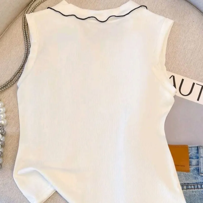 Blusa con adorno