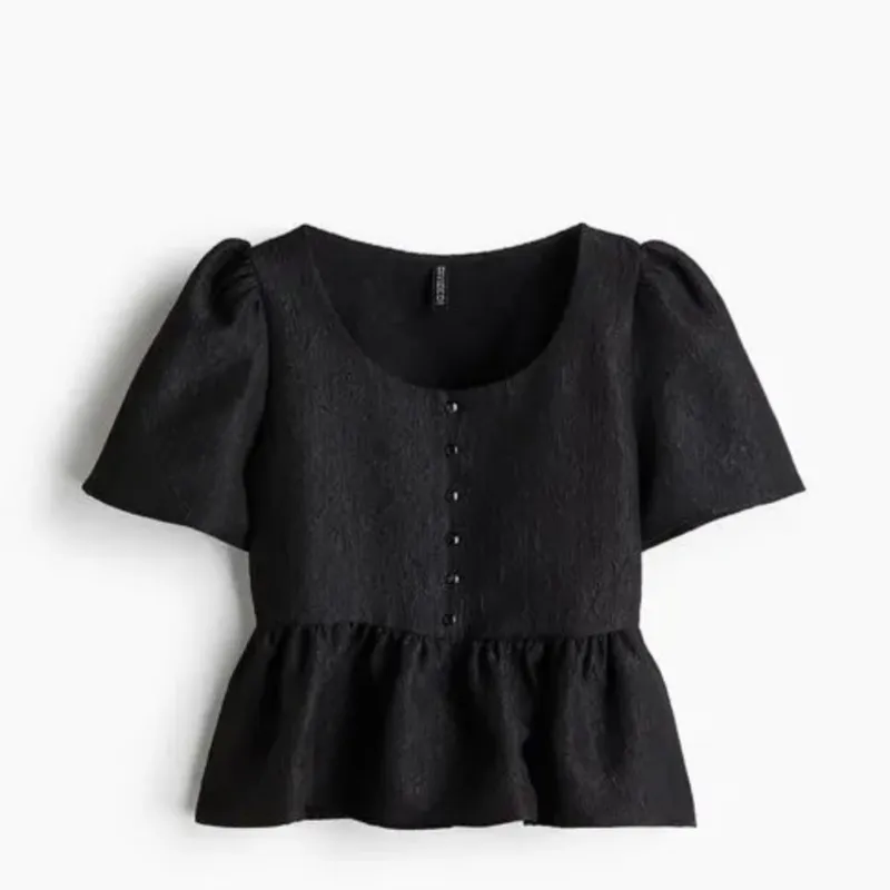 Blusa negra botones 