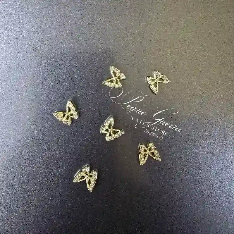 Mariposa dorada con piedra.  Venta x parejas 