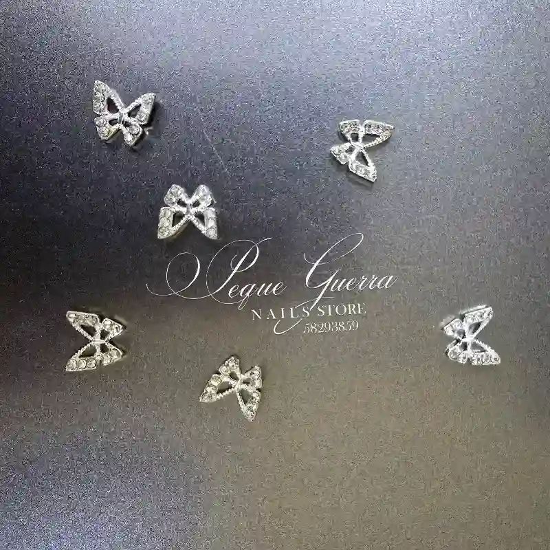 Mariposa plateada con piedra. Venta x parejas