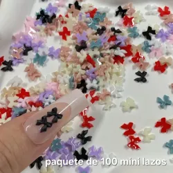 Paquete con 100 mini lazos coquette