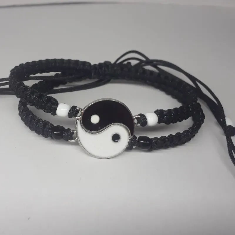 Pareja de pulseras con conector ying yang