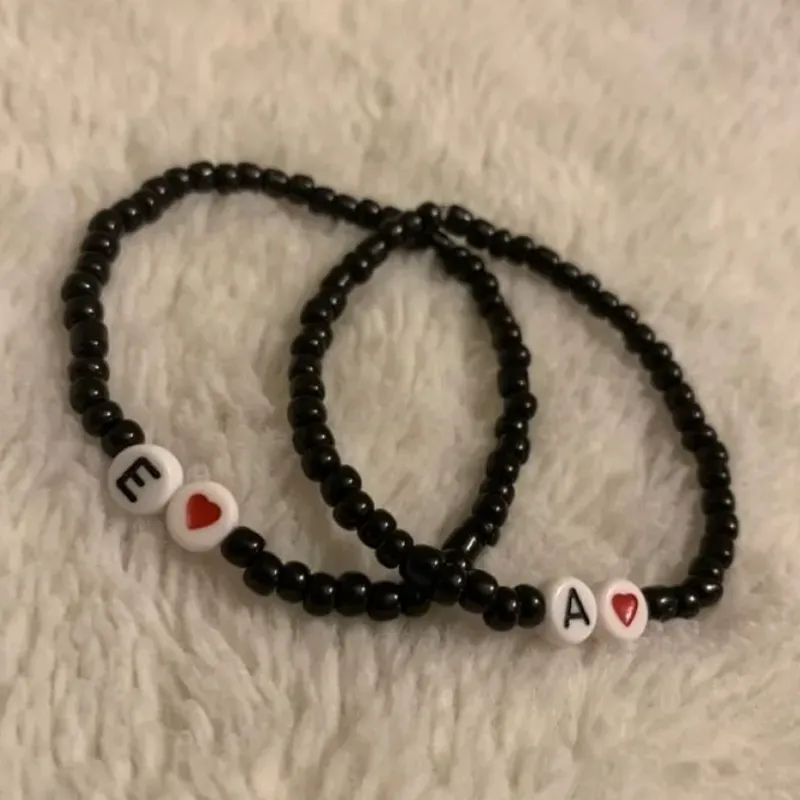 Pareja de pulseras con shakiras y lunetas 