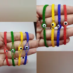 Pulsera tejida  con ojos turcos 