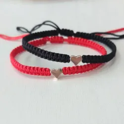 Pulsera tejida con Corazón plateado 
