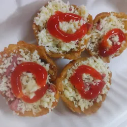 Tostones con salchicha y queso 