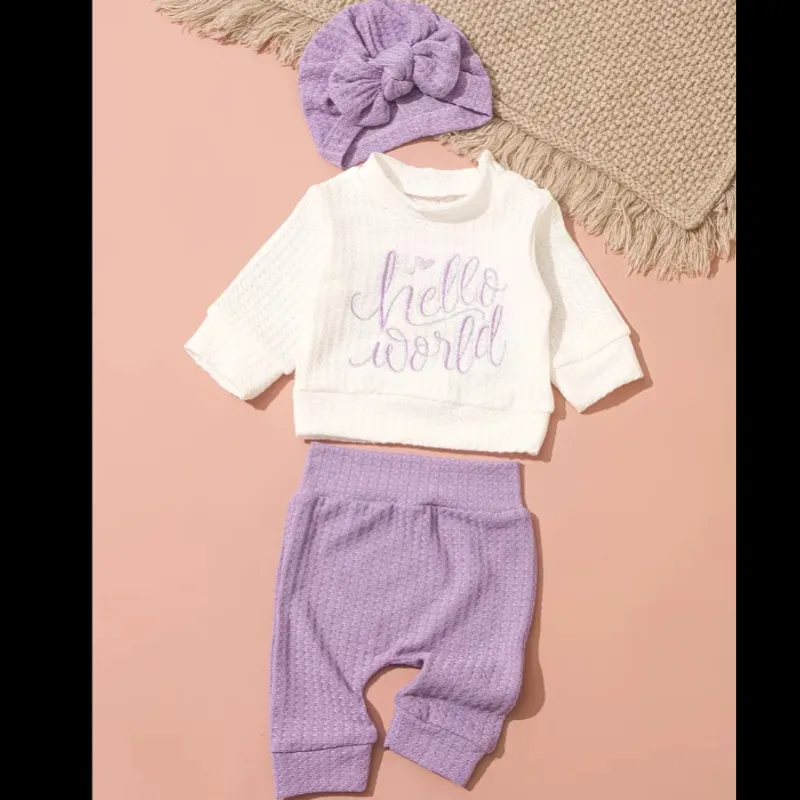 Conjunto de tres piezas en rosado y morado de niña