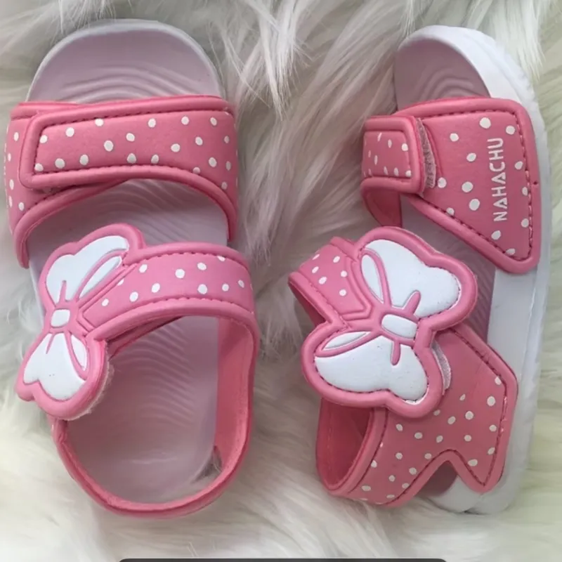 Sandalias engomadas con lazo