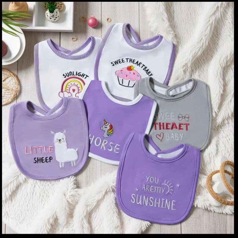 Set de tres baberos para bebé