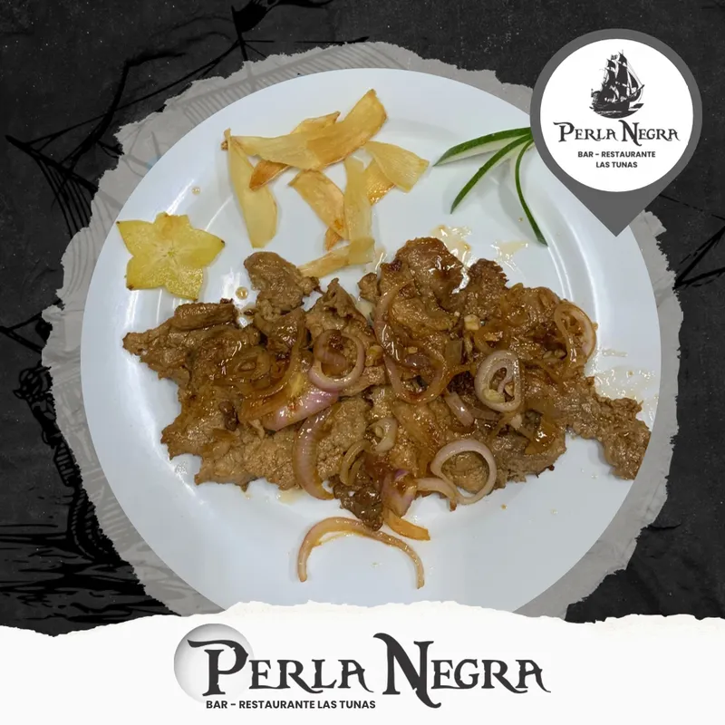 Bistec de Cerdo encebollado 