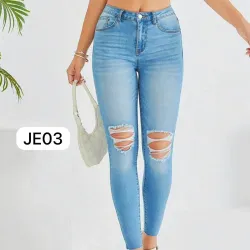 Jeans skinny azul con rotos
