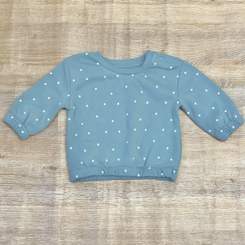 Abrigo color verde con puntos blancos 