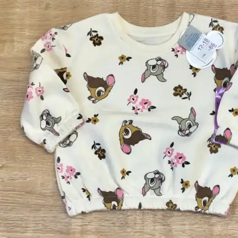 Abrigo con Bambi y flores