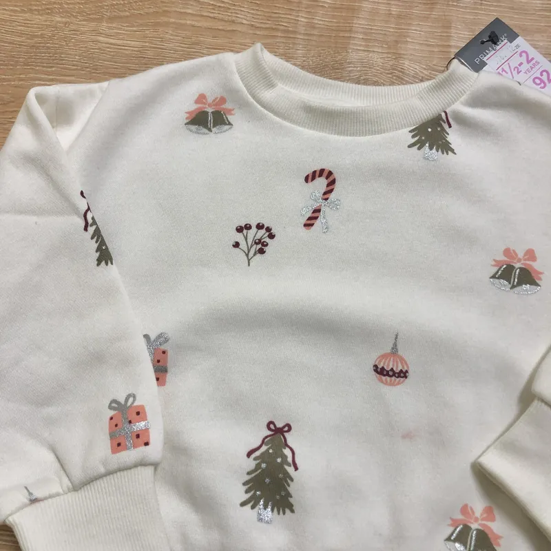 Abrigo con motivos navideños