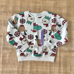 Abrigo con motivos navideños 