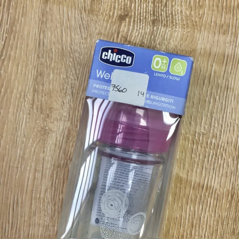 Biberón de cristal color rosado 