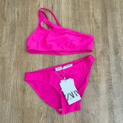 Bikini Zara de una manga color rosado 