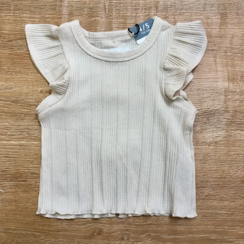 Blusa color crema con lazos 