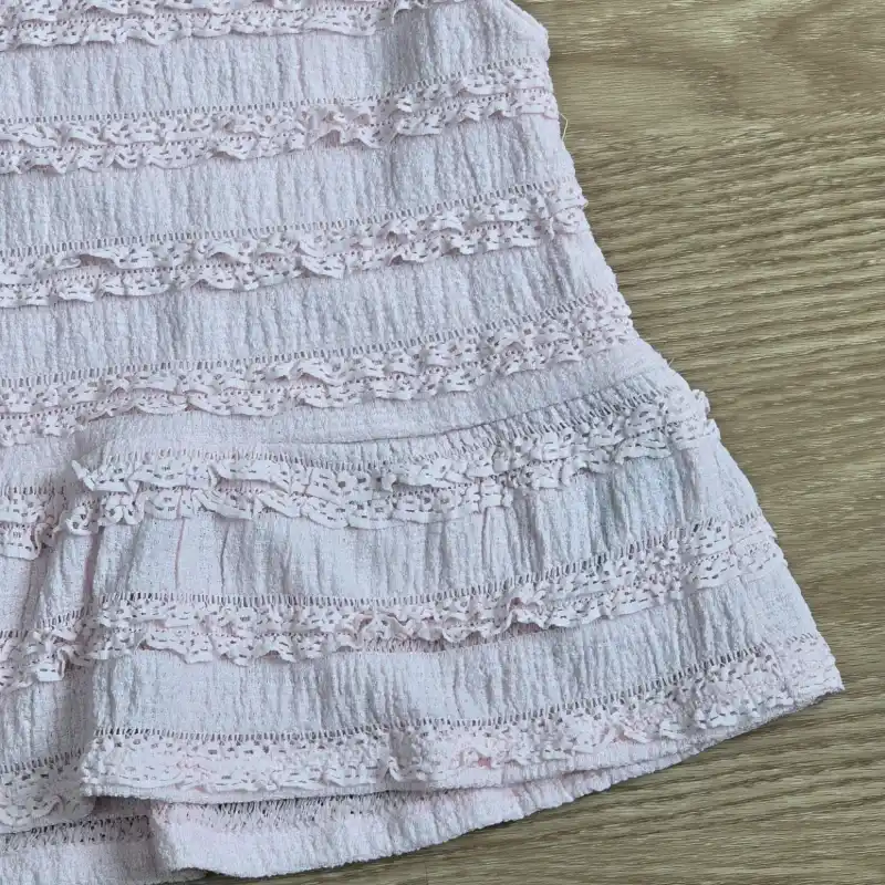 Blusa color rosada con vuelos