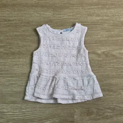 Blusa color rosada con vuelos