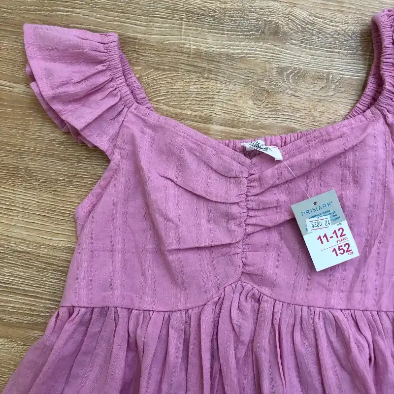 Blusa color rosado con vuelos 