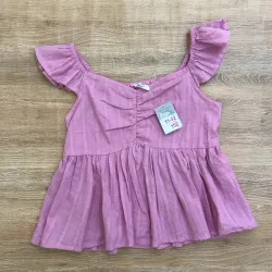 Blusa color rosado con vuelos 