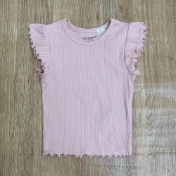 Blusa con mangas de vuelo color rosado 