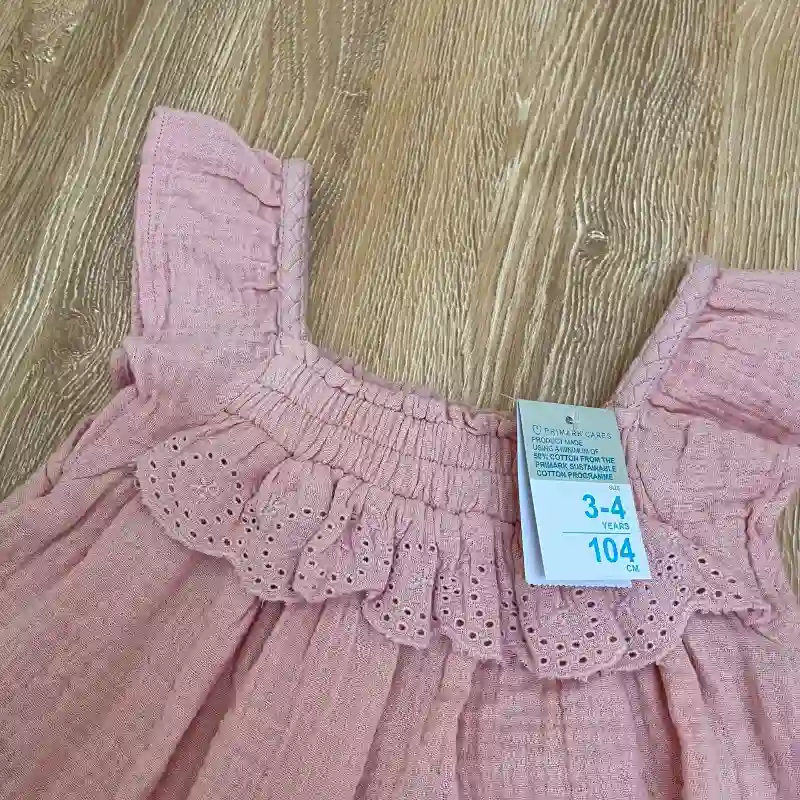 Blusa con vuelo color rosado