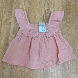 Blusa con vuelo color rosado