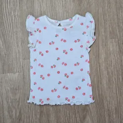 Blusa con Vuelos blanca con flores naranjas