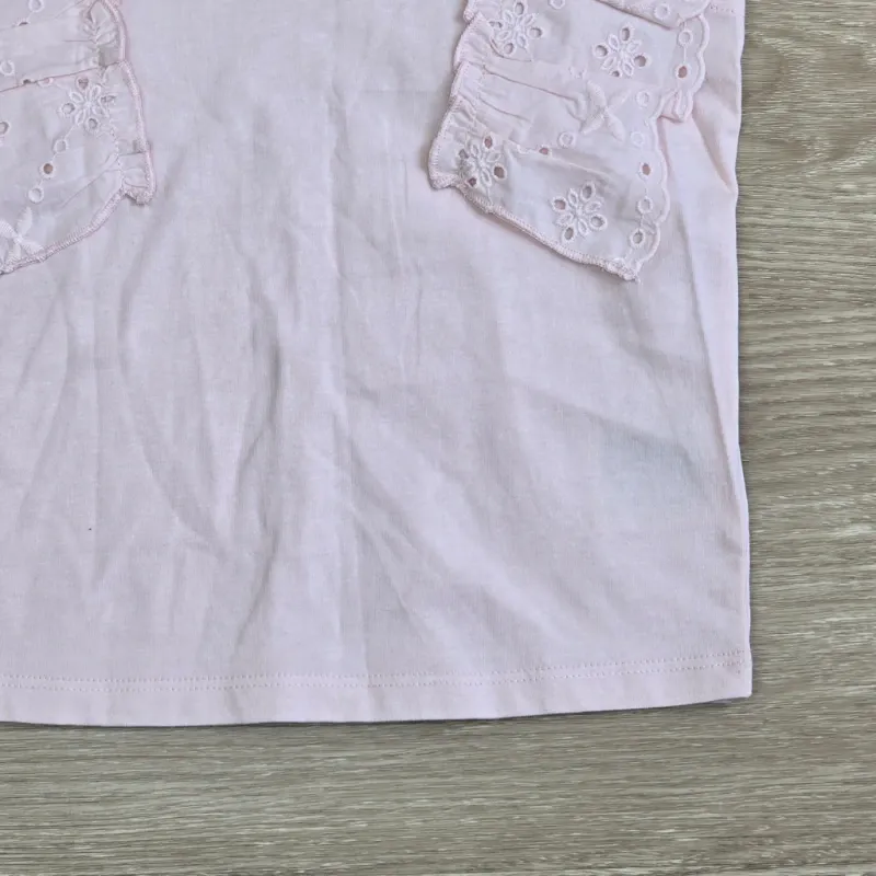 Blusa con vuelos color rosa