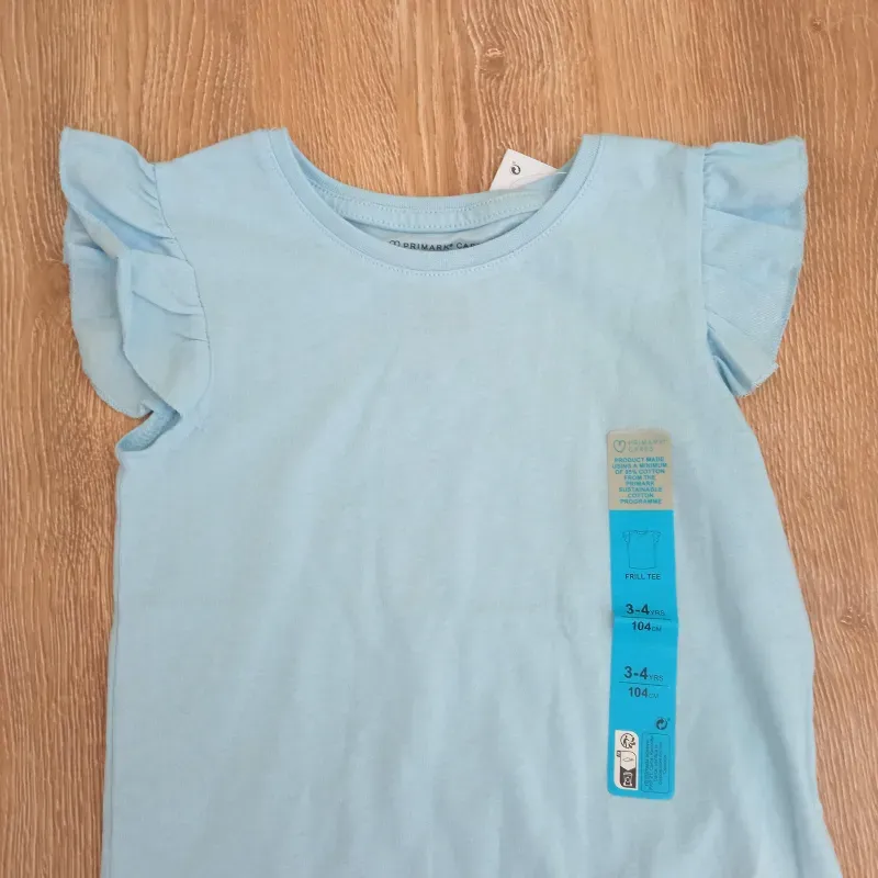 Blusa con vuelos en las mangas color azul 
