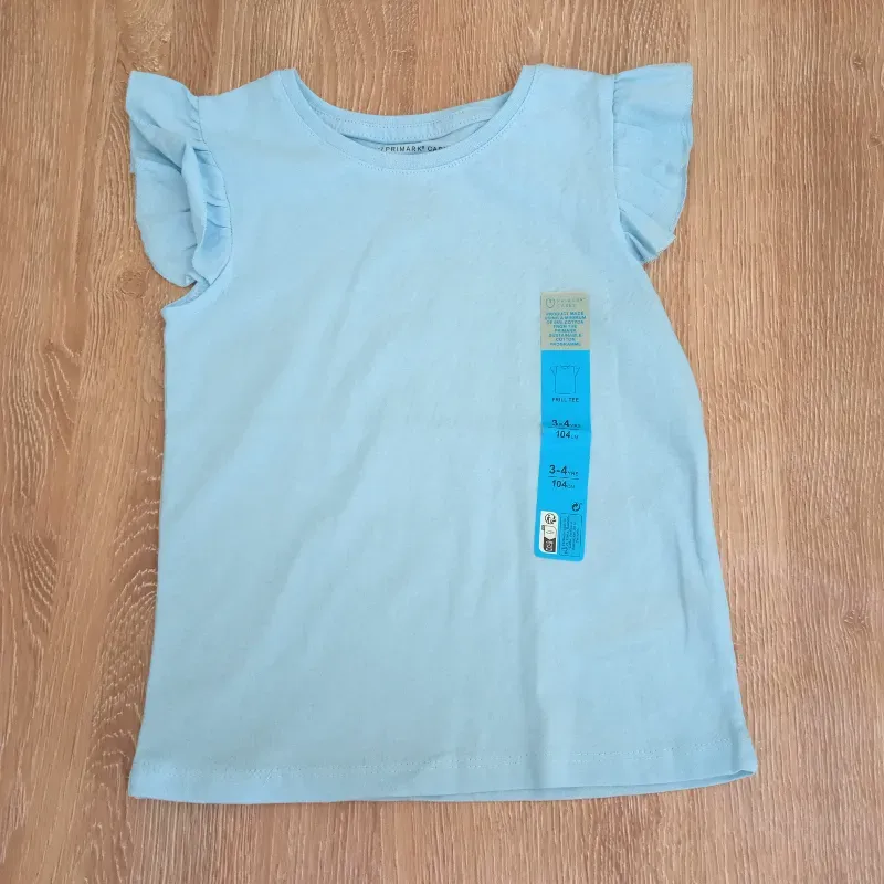 Blusa con vuelos en las mangas color azul 