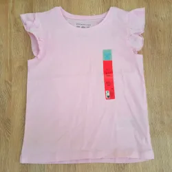 Blusa con vuelos en las mangas color rosado 