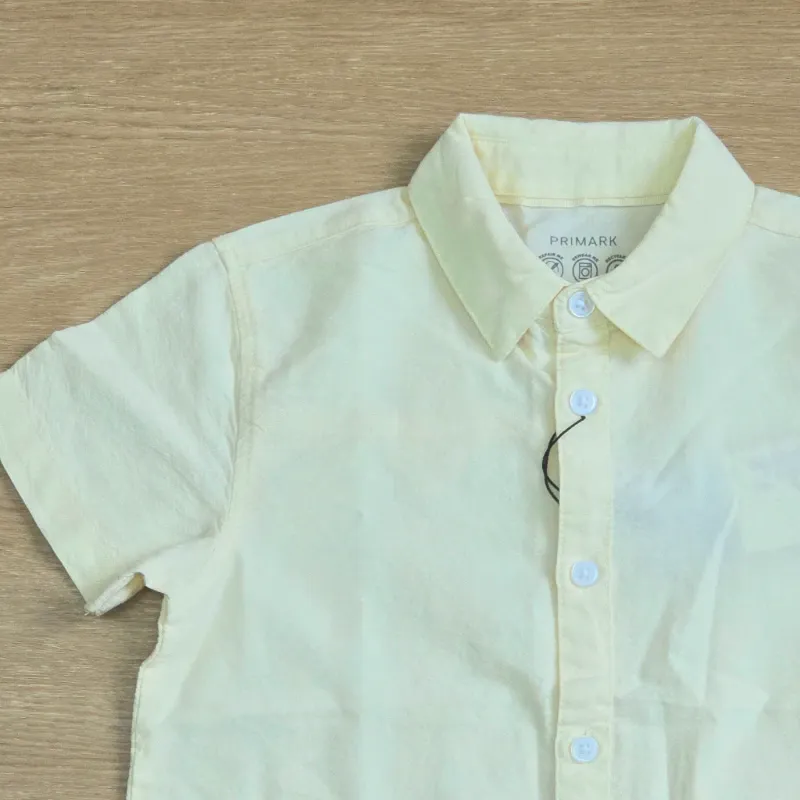 Camisa amarilla básica