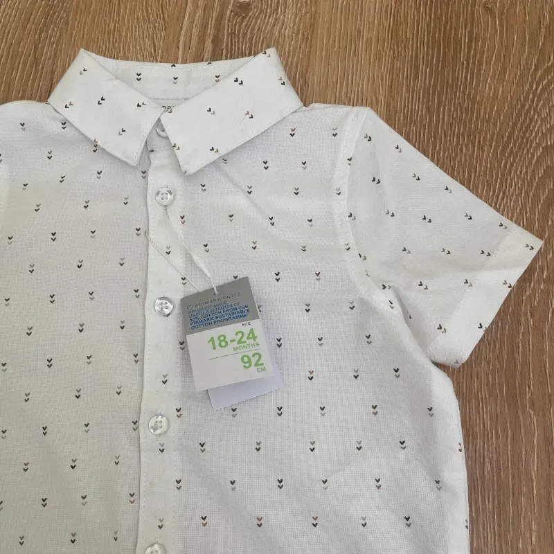 Camisa blanca con detalles en marrón 