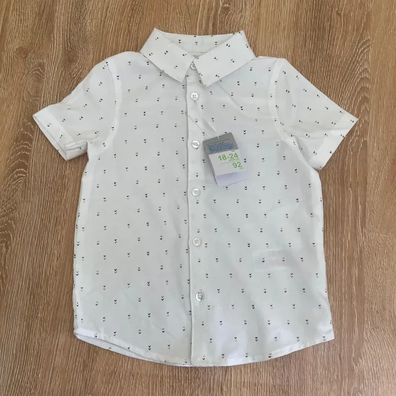 Camisa blanca con detalles en marrón 