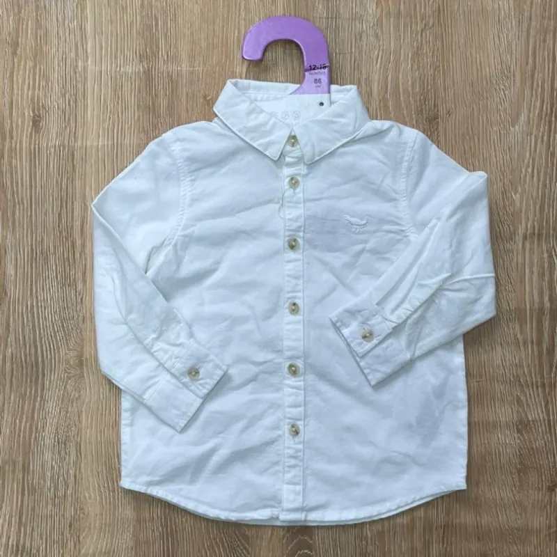 Camisa blanca de mangas largas 