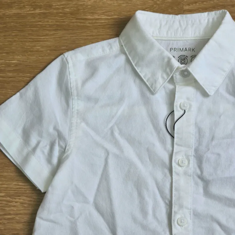 Camisa blanca mangas cortas
