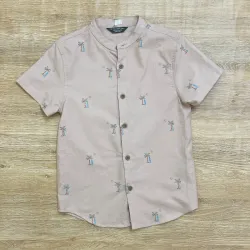 Camisa con palmeras color rosa 