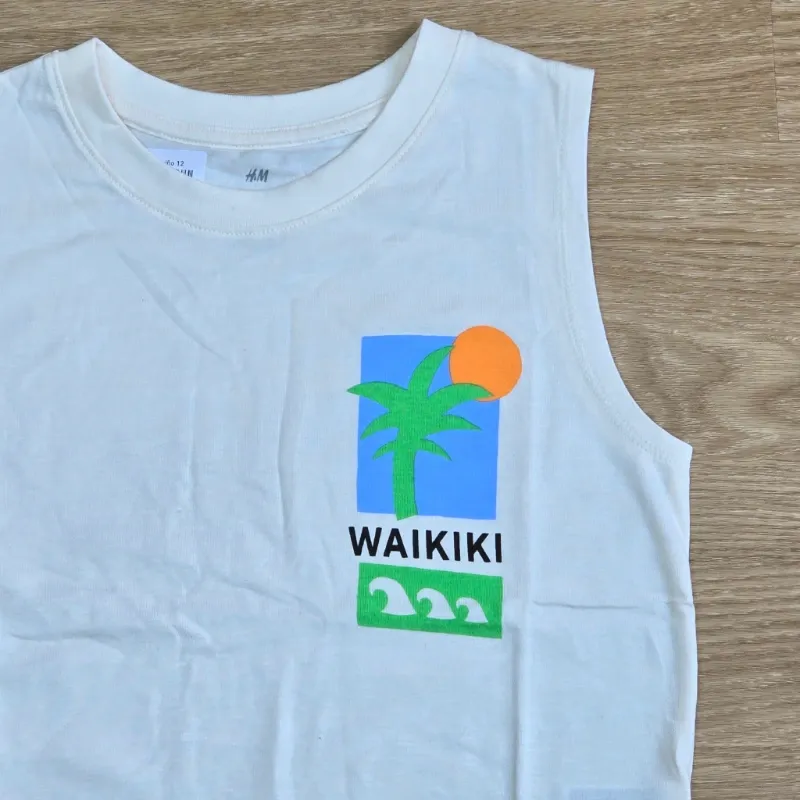 Camiseta color beich con Palma