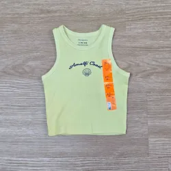 Camiseta de Canalé color amarillo con concha