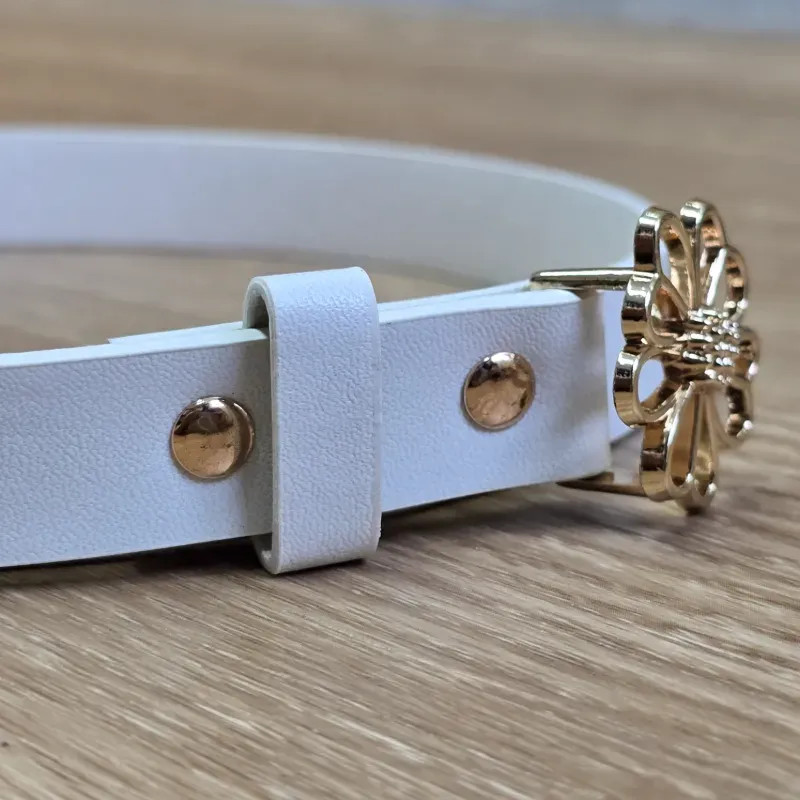 Cinto de niña color blanco con hebilla de flor