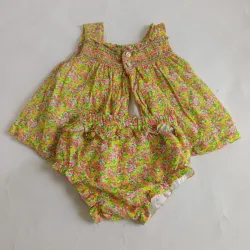 Conjunto amarillo y rosado
