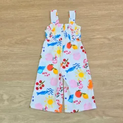 Conjunto blanco con adornos de playa